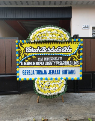Papan Bunga Duka di Surutanga